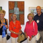 Tom Maher awarded artists with ribbons for “favorite art choices” voted on by over 100 hospital employees.
